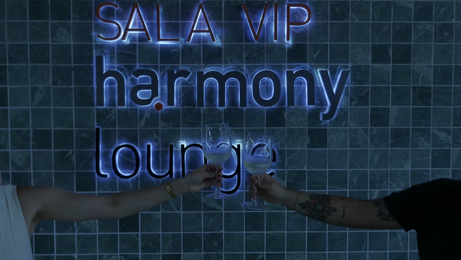 A toast under the lounge sign